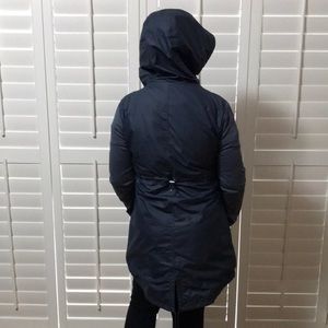 This is a very attractive active wear light weight jacket just above the knees.